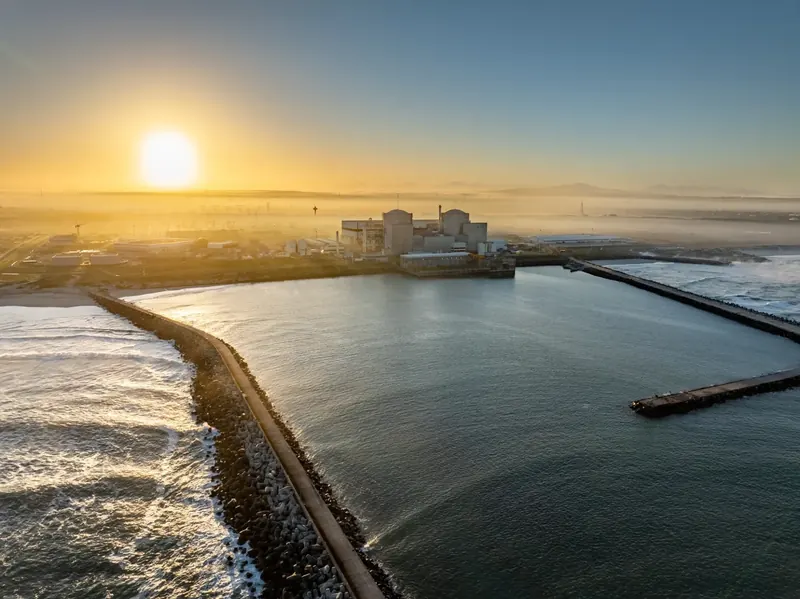 Koeberg Power Station at sunrise, seen from the air over the sea